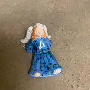 Very special Mississippi artist, Susan Clark, angel.  This one is called sleepy.